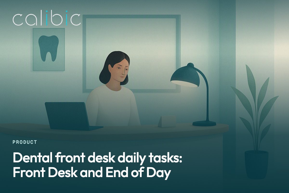 A dental front desk at closing time with one desk lamp switched on